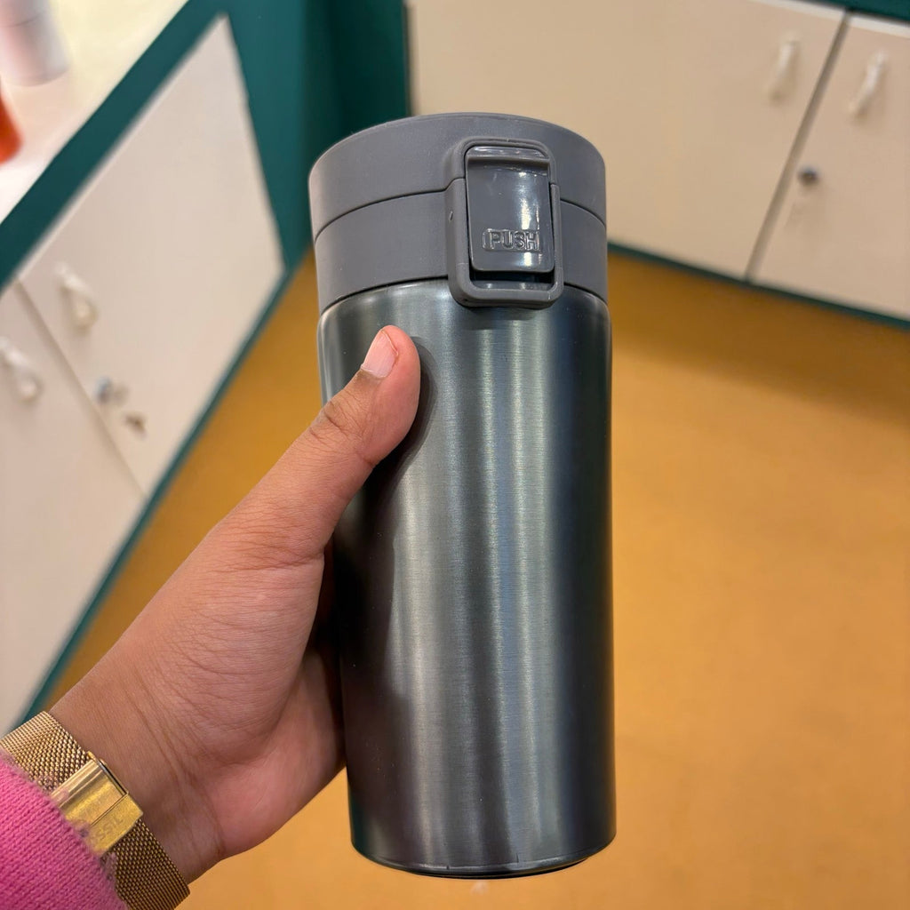 Steel Travel Mug with Flip Lid - Steel - real product photo