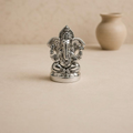 Vighnaharta silver finish Ganesh idol, handcrafted metal craft